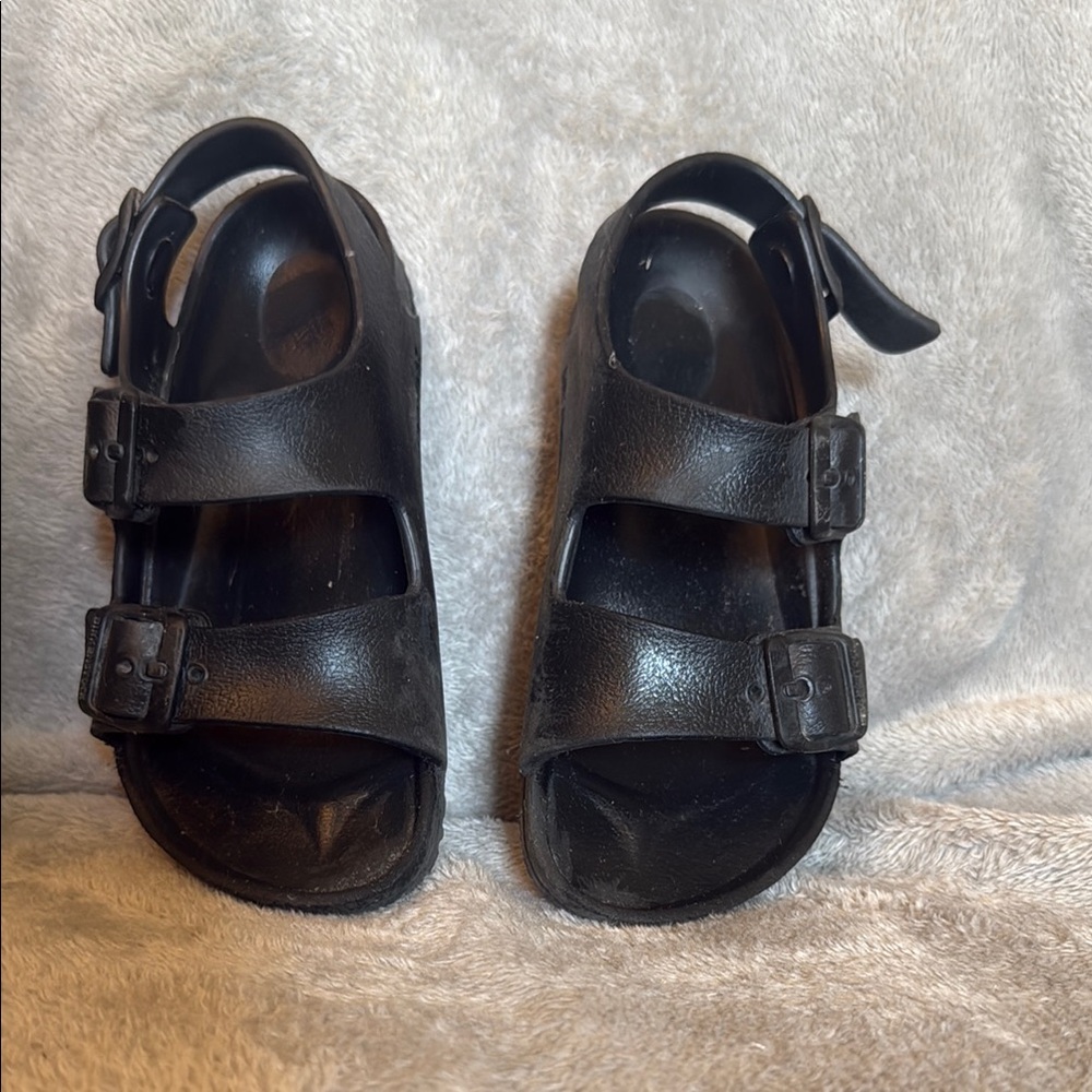 Birkenstock Black Sandals with Adjustable Straps and Molded Footbed